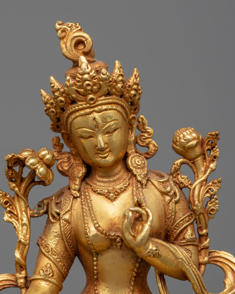 small statue of-white-tara