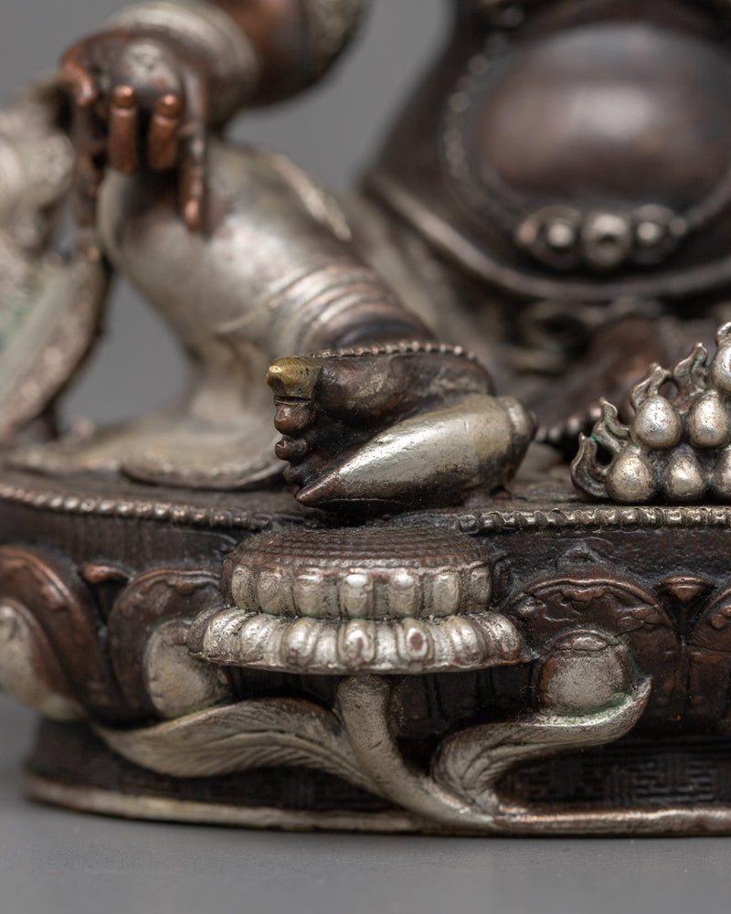 Miniature Dzambhala Statue | Silver-Plated Symbol of Prosperity