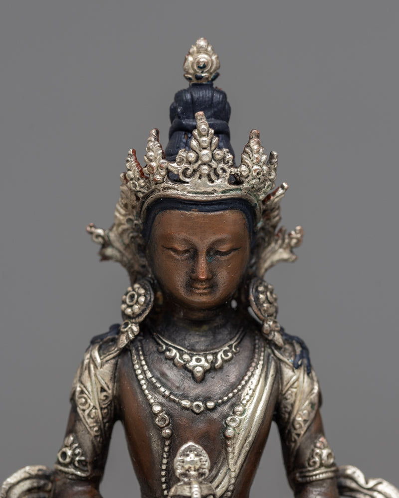 small statue of-amitayus