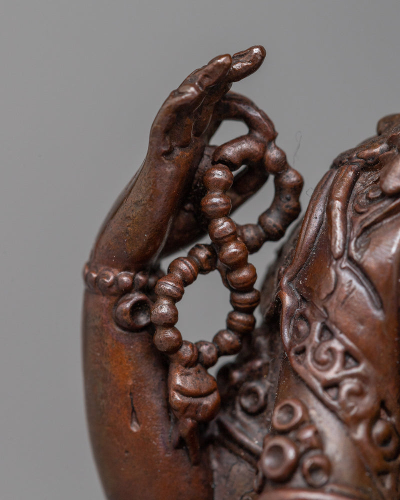 Machine-Made Chenrezig Statue | A Compact Oxidized Copper Emblem of Compassion